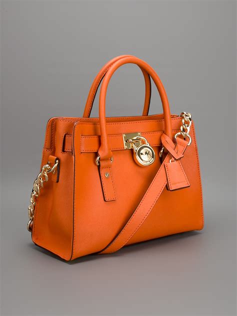 portemonnees michael kors orgineel|Michael Kors orange bag.